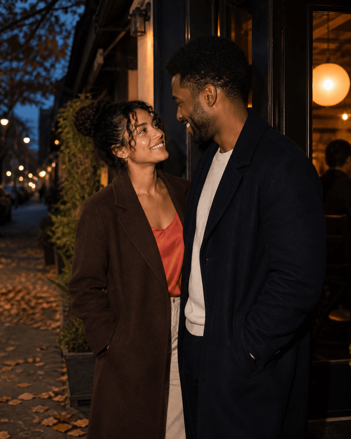 Two people talking outside a Brooklyn restaurant in autumn