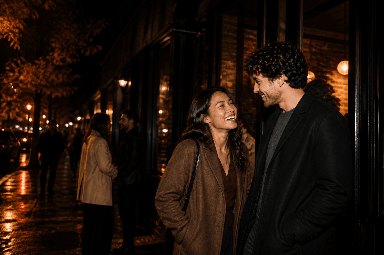 A couple connecting outside a New York City restaurant on an autumn evening